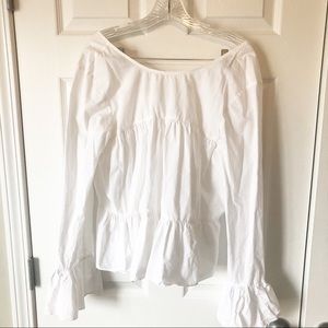 White ruffled blouse